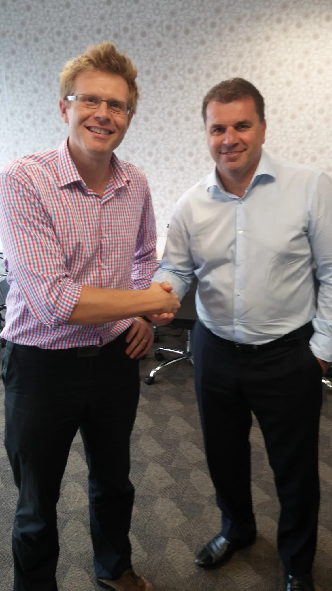 Dougal Guppy pictured with a leading football figure